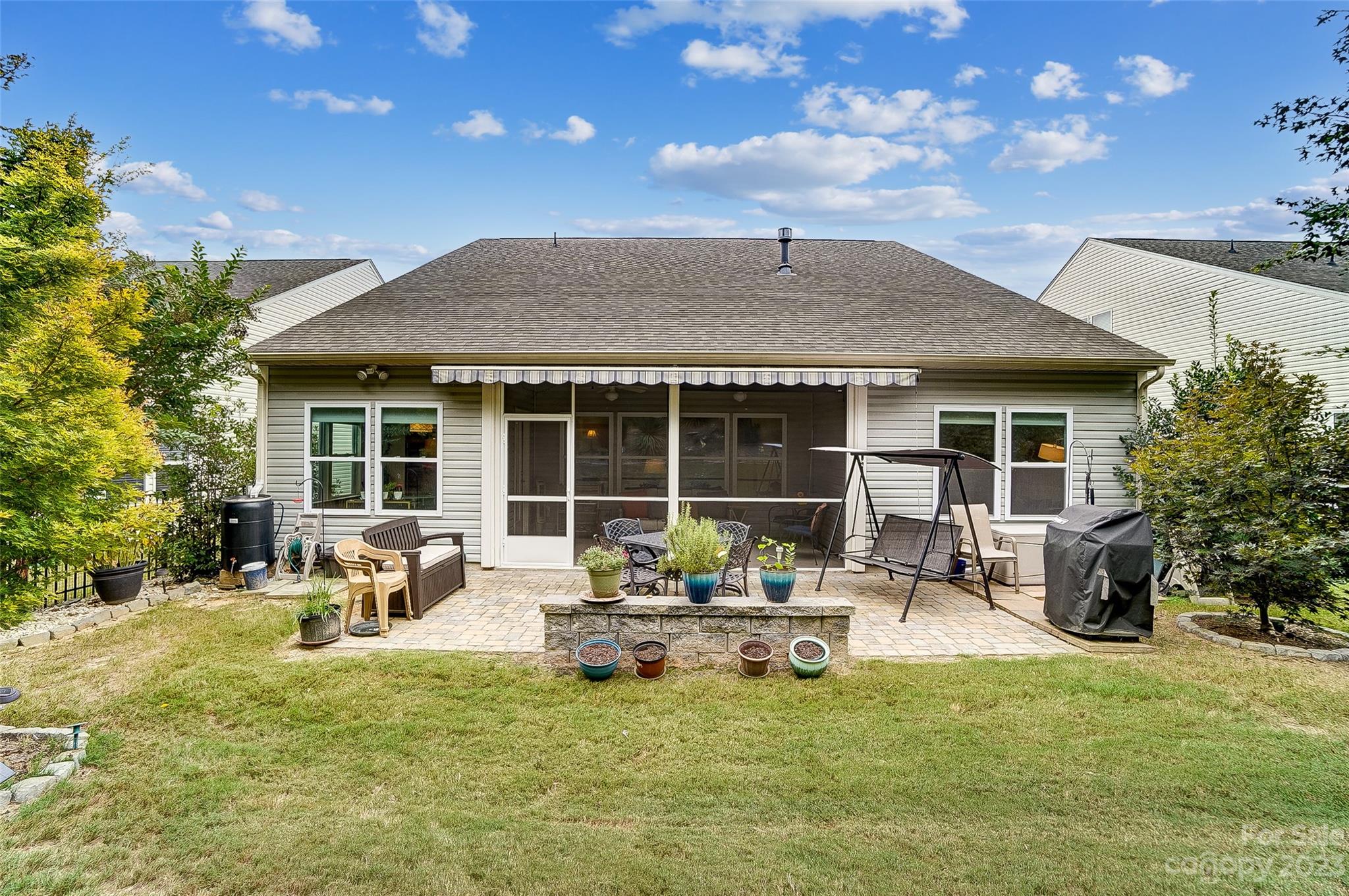 1862 Larkspur Way Tega Cay, SC 29708 - Photo 33 of 37 a house with garden in front of it