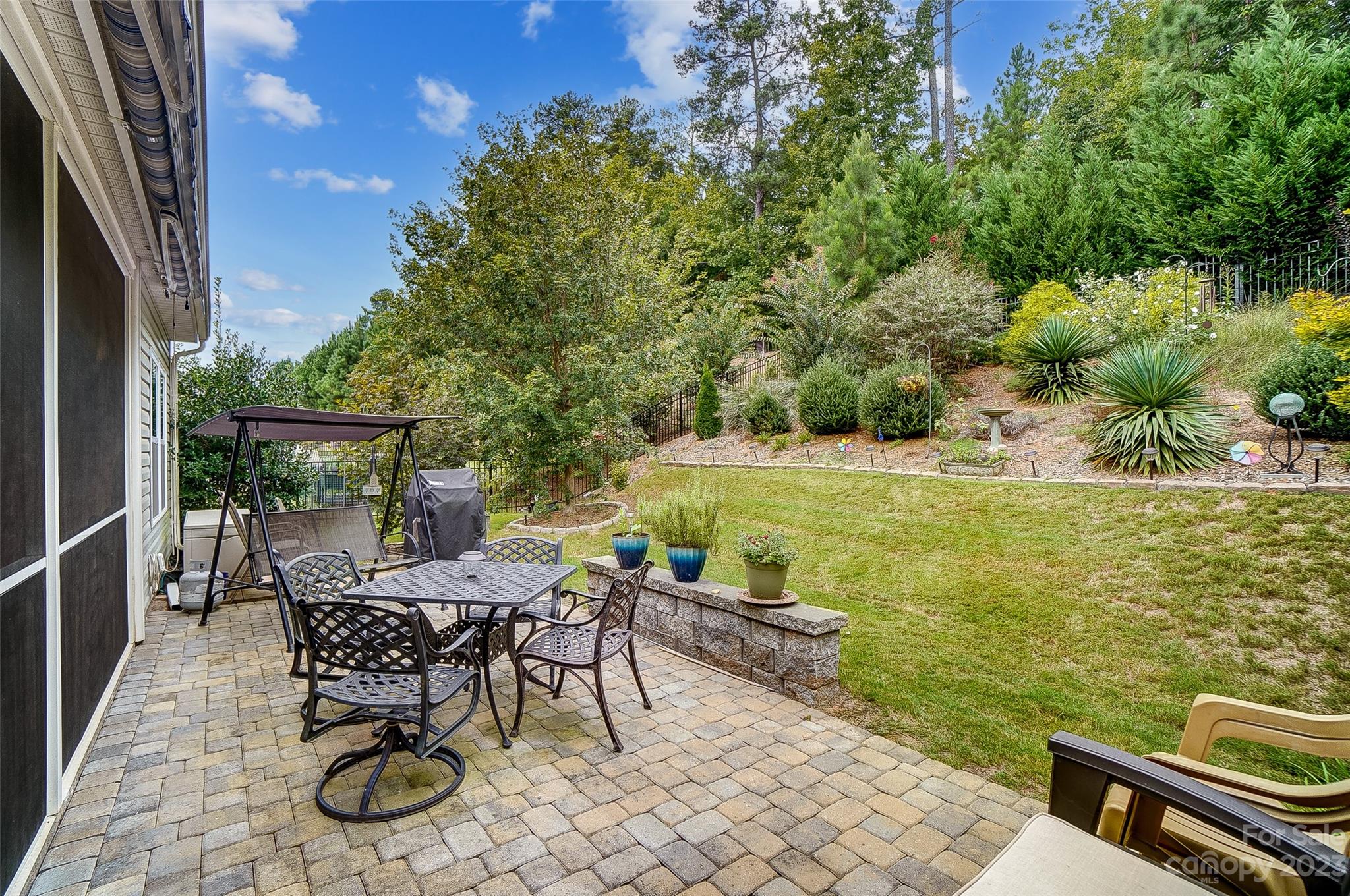 1862 Larkspur Way Tega Cay, SC 29708 - Photo 35 of 37 a view of a chairs and table on the terrace