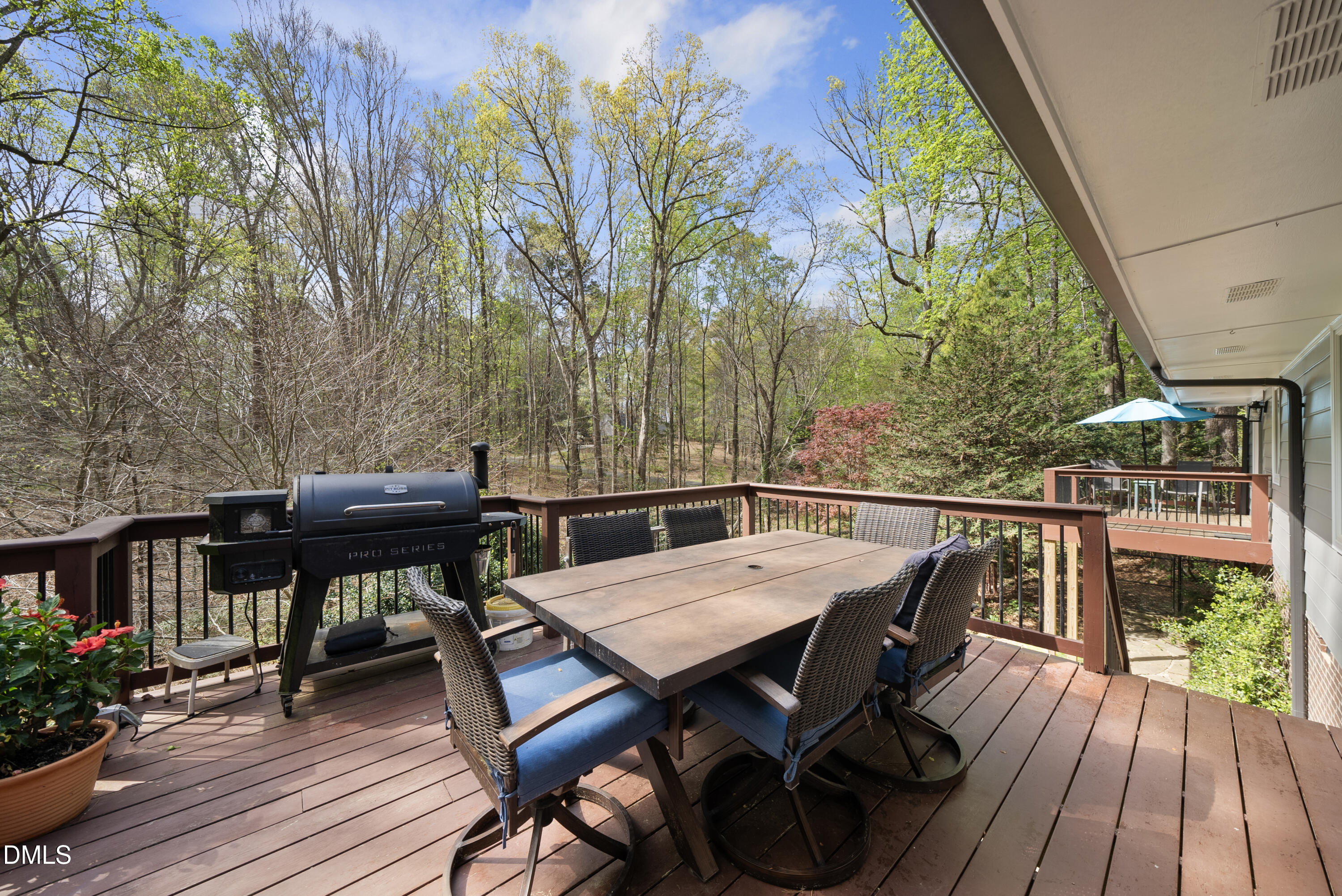 6200 Splitrock Trail Apex, NC 27539 - Photo 33 of 64 a view of a dinning table and chairs on the roof deck