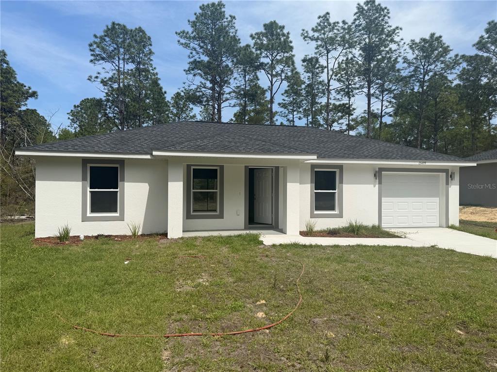 front view of a house and a yard