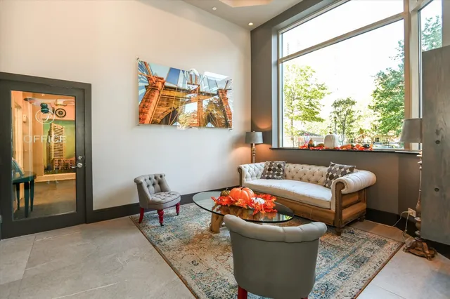 a living room with furniture and a window