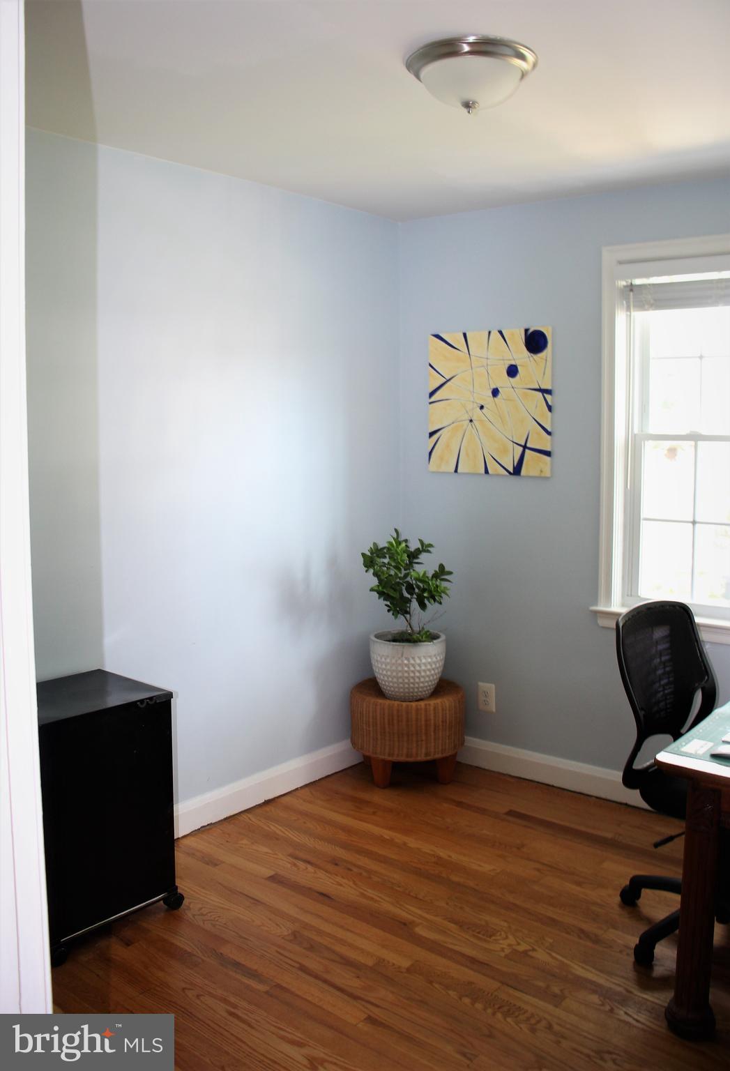 1746 Glen Ridge Road Towson, MD 21286 - Photo 24 of 48 a view of a workspace with wooden floor and a window