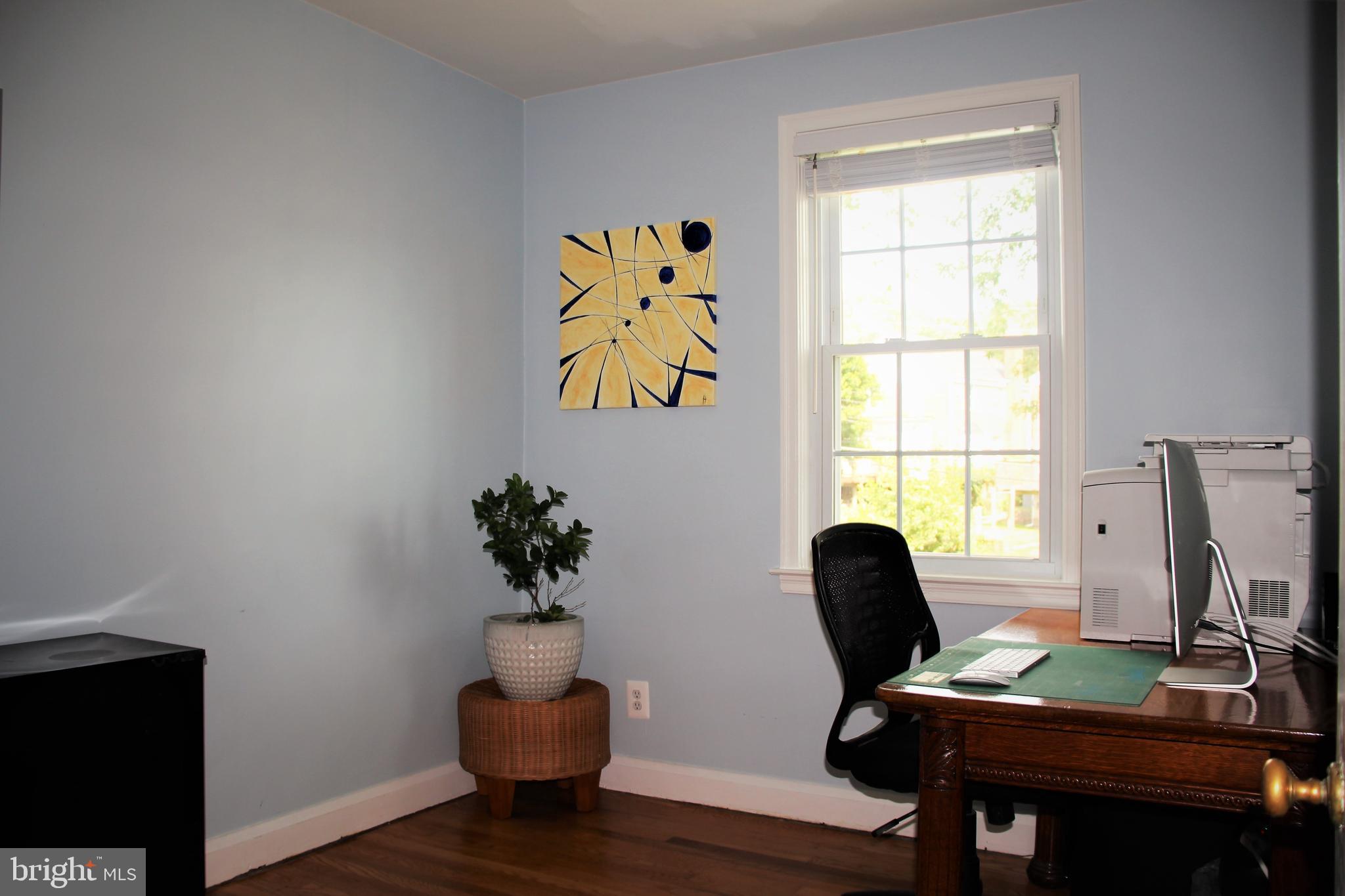 1746 Glen Ridge Road Towson, MD 21286 - Photo 25 of 48 a view of a workspace with furniture and a window