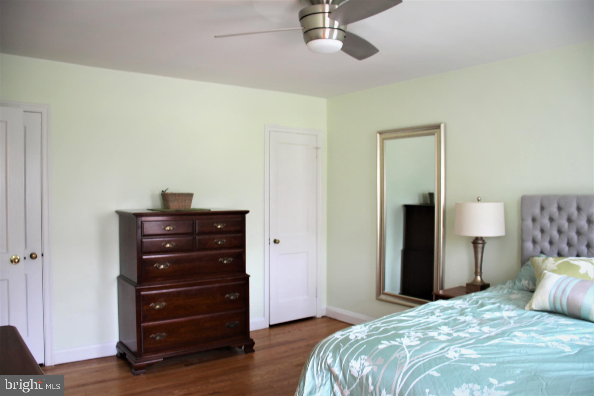 1746 Glen Ridge Road Towson, MD 21286 - Photo 33 of 48 a bedroom with a bed and a dresser