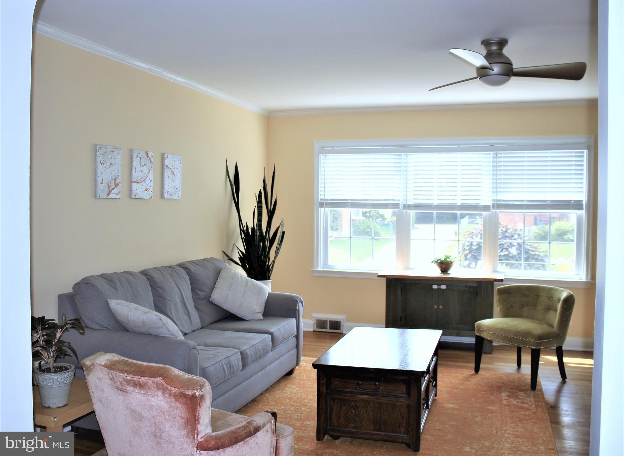 1746 Glen Ridge Road Towson, MD 21286 - Photo 6 of 48 a living room with furniture and a window