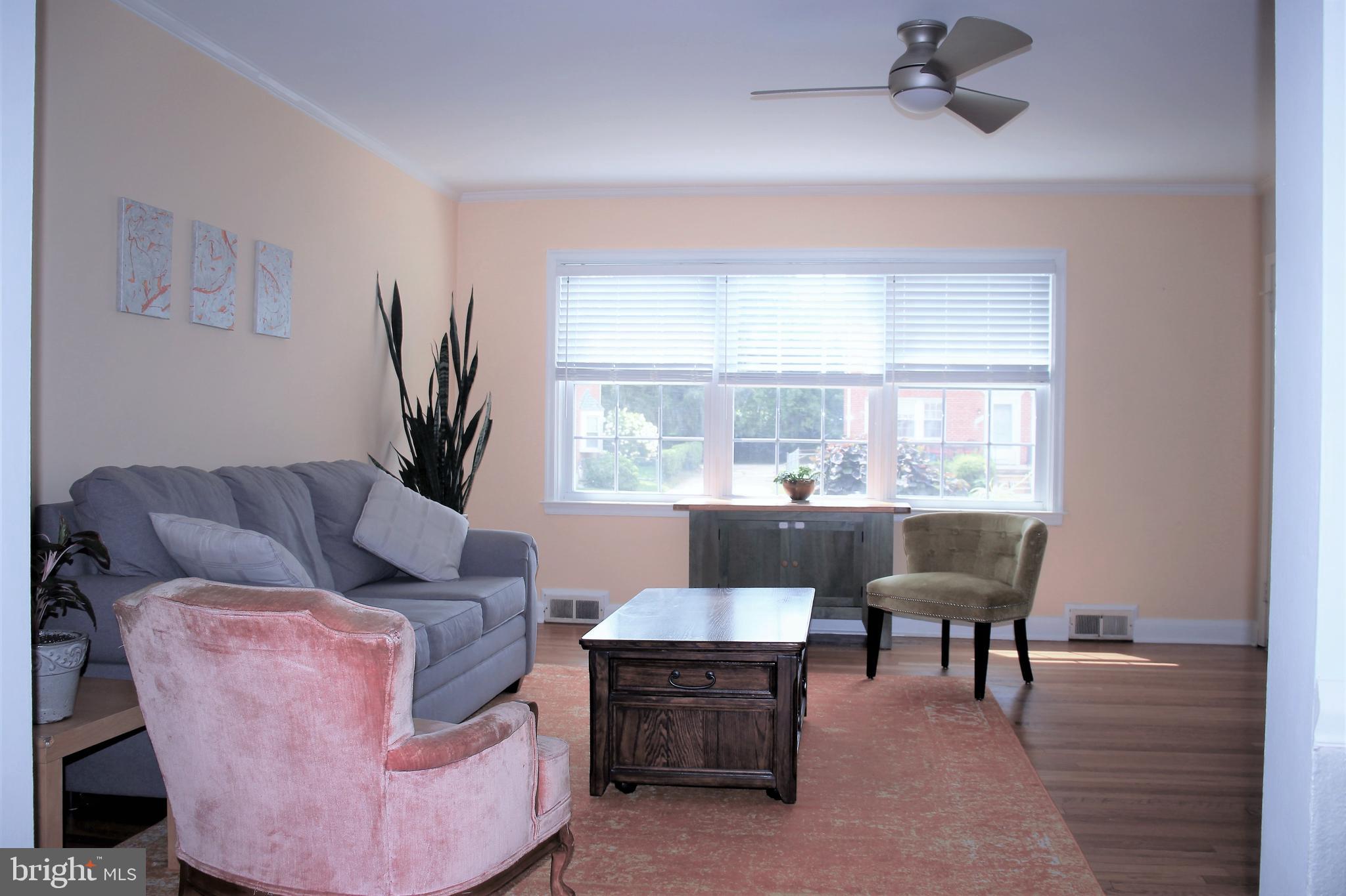 1746 Glen Ridge Road Towson, MD 21286 - Photo 7 of 48 a living room with furniture and a large window