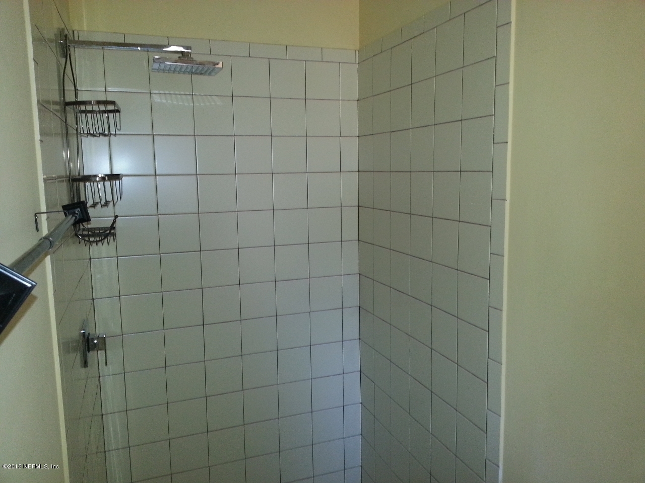 7253 Sandhurst Road South Jacksonville, FL 32277 - Photo 5 of 13 a bathroom with a shower