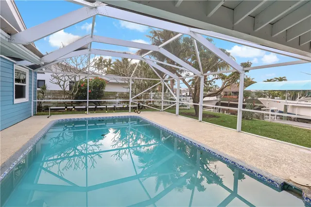 a view of backyard with garden and entertaining space