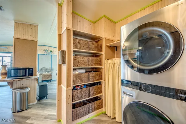 a close view of a utility room with washer and dryer