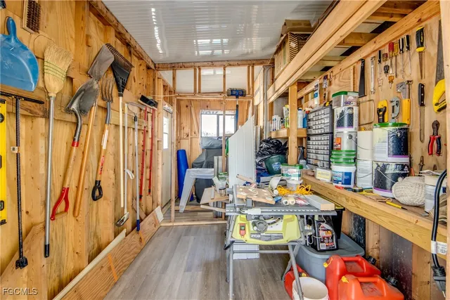 a front view of a house with a lake view