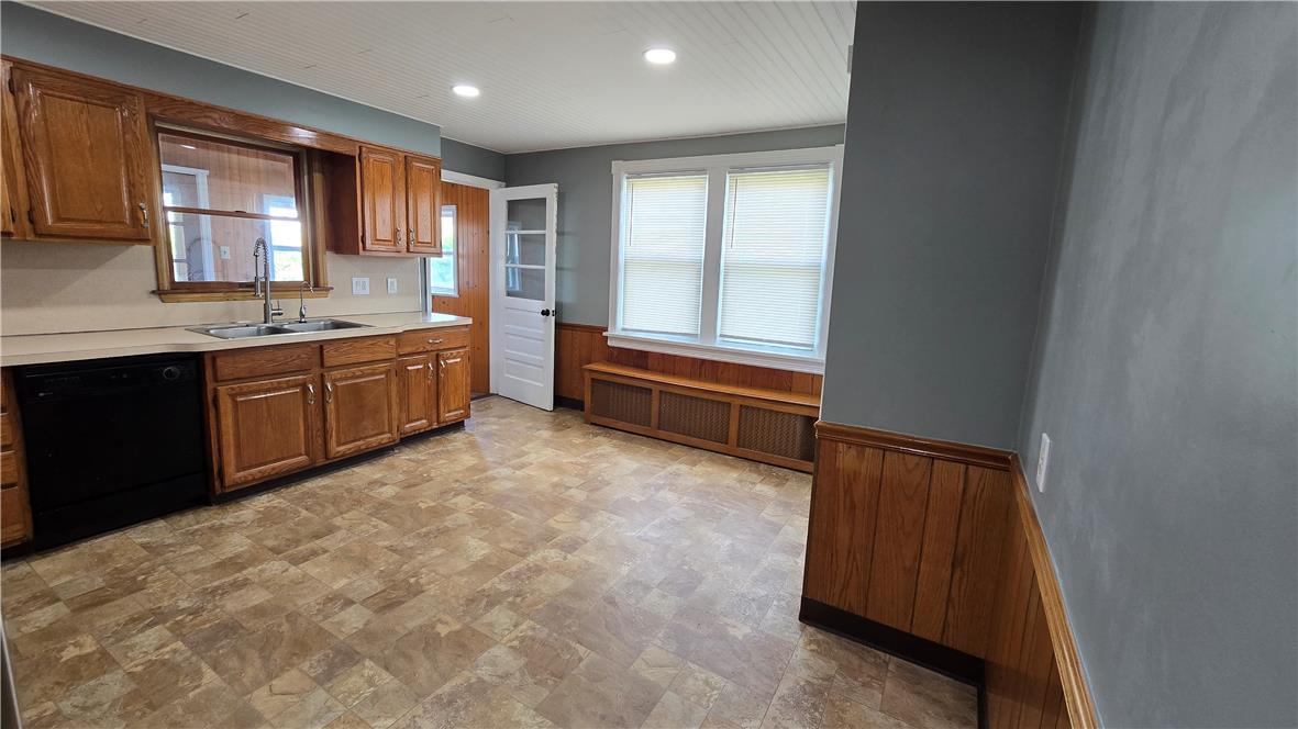 883 North Locust Street Hazleton, PA 18201 - Photo 17 of 83 Functional kitchen offers ample cabinetry and counter space, with convenient window views.