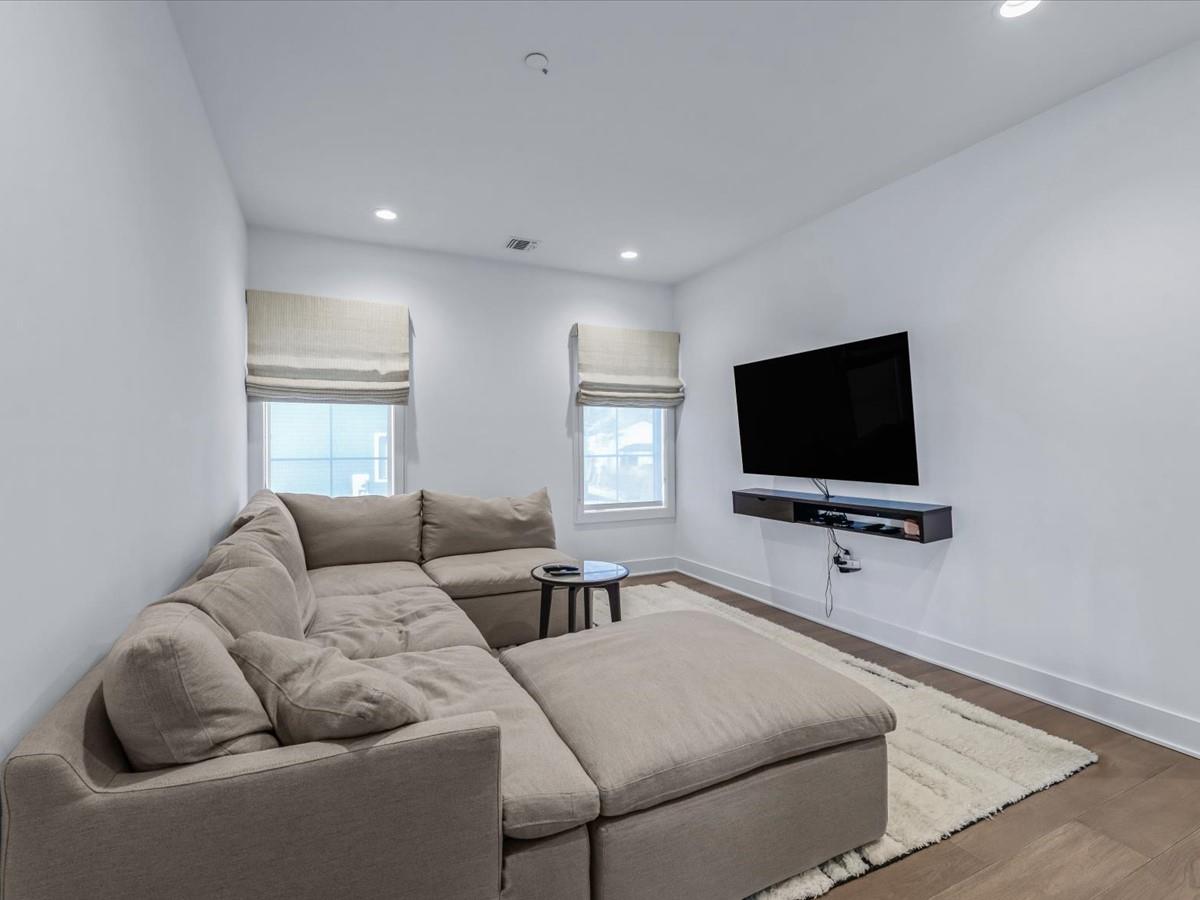 1 Sequoia Circle Manhasset, NY 11030 - Photo 11 of 24 a living room with furniture and a flat screen tv