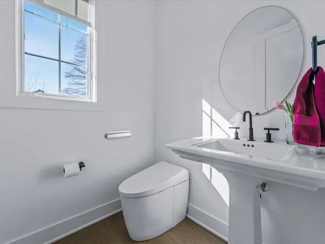 a bathroom with a sink and a toilet