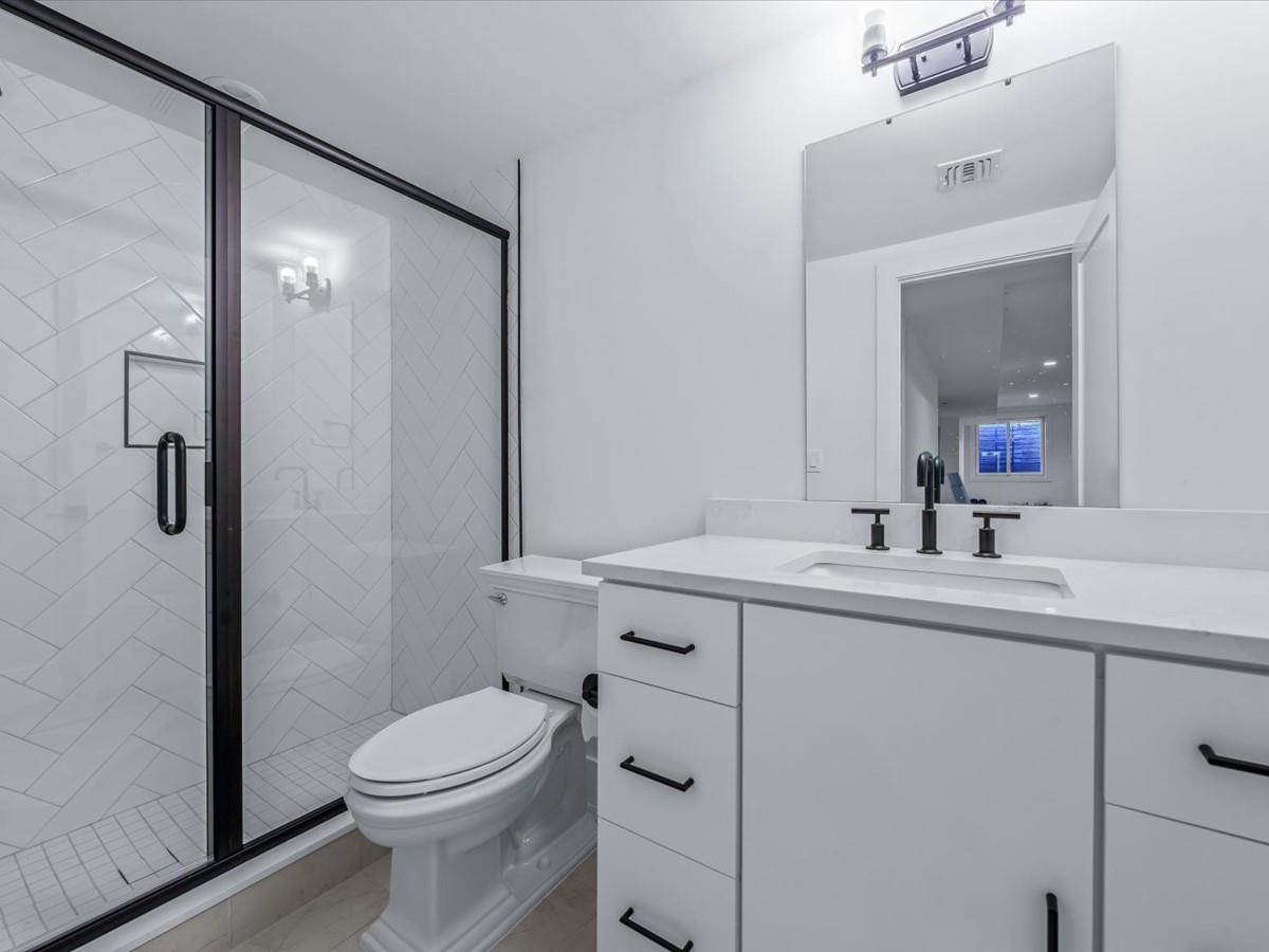 1 Sequoia Circle Manhasset, NY 11030 - Photo 20 of 24 a bathroom with a sink a toilet and shower