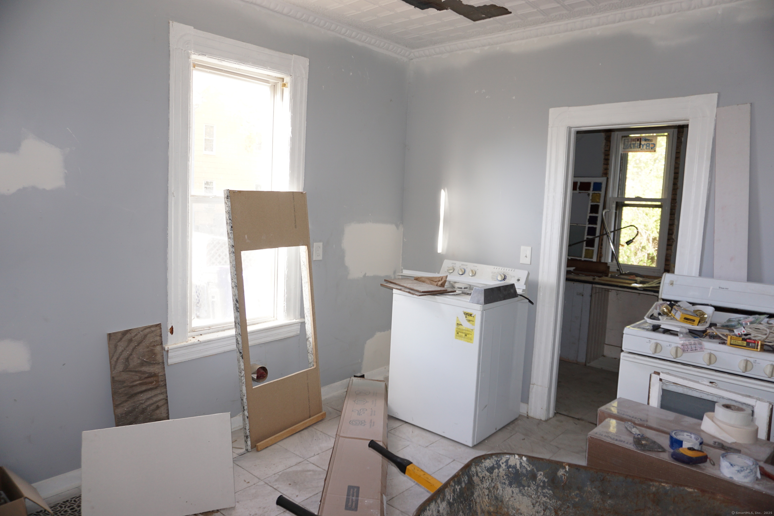 69 Gates Street Holyoke, MA 01040 - Photo 12 of 13 a utility room with dryer and washer