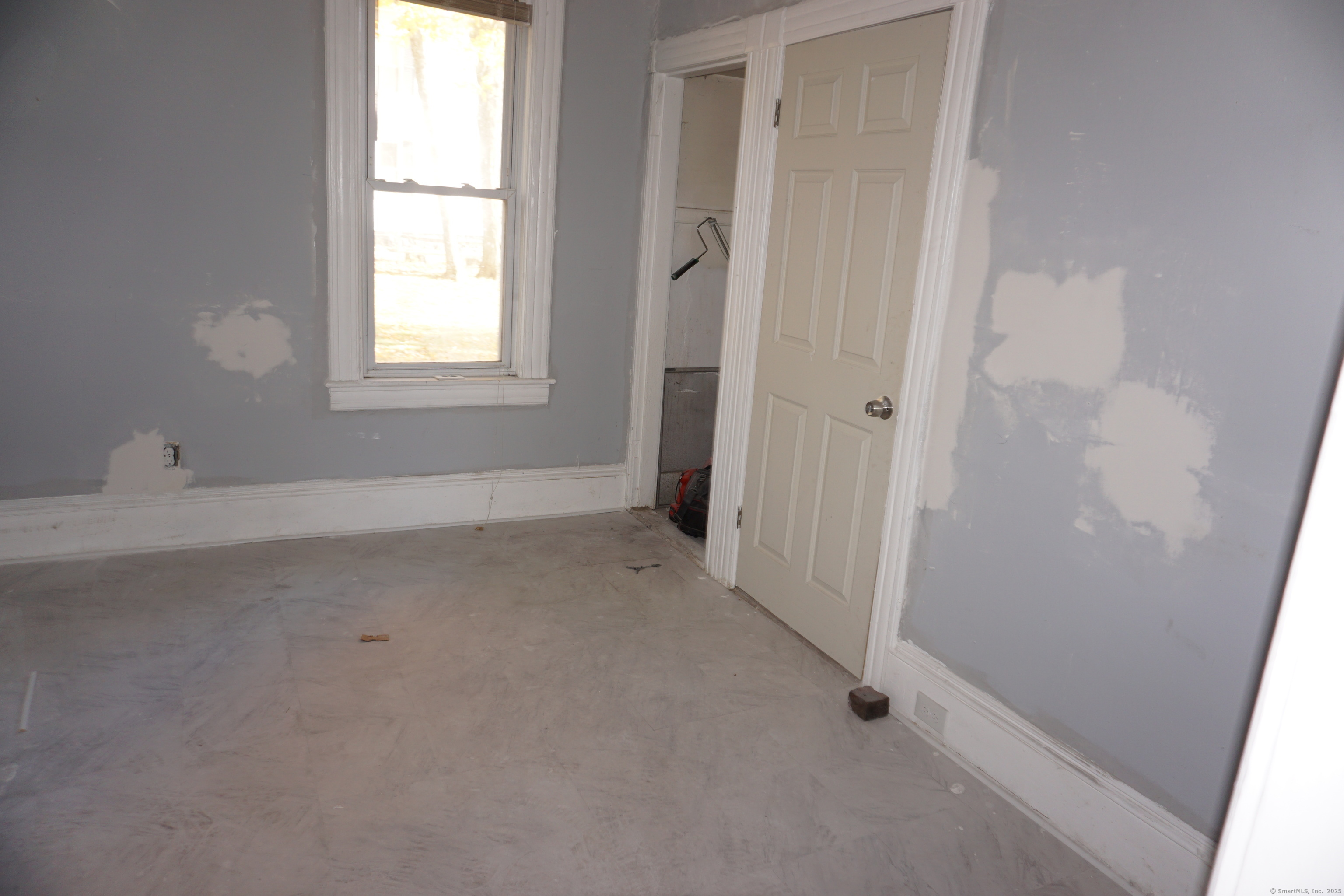 69 Gates Street Holyoke, MA 01040 - Photo 9 of 13 an empty room with windows