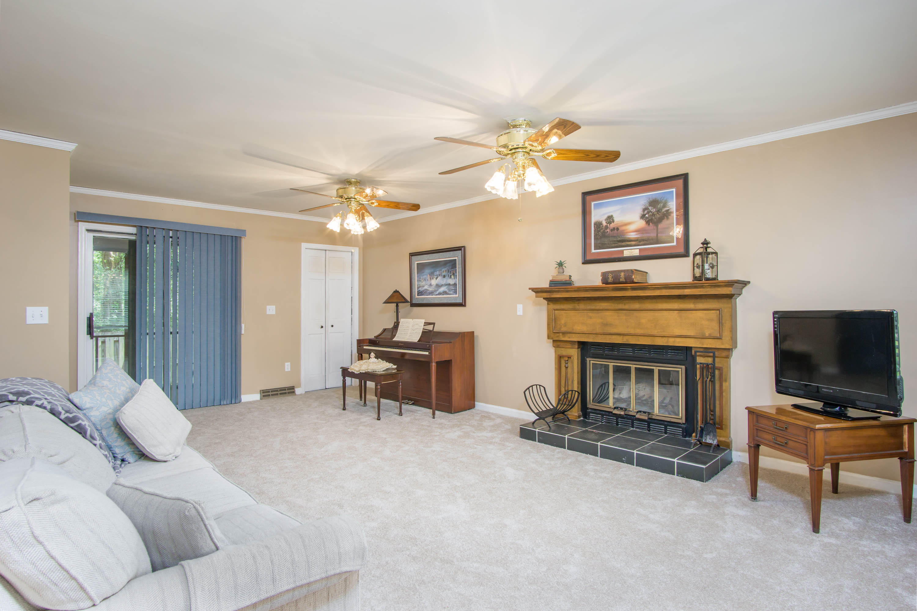 950 Orange Grove Road Charleston, SC 29407 - Photo 11 of 18 Living room & wood buring fireplace
