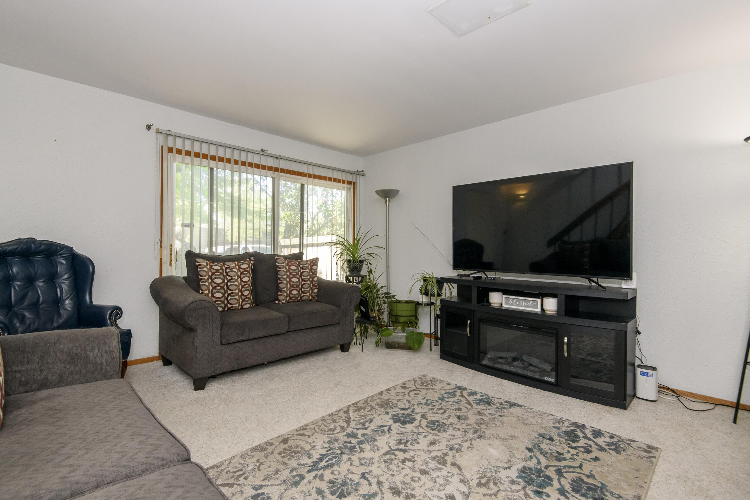 6941 West Glenbrook Road, Unit 3 Milwaukee, WI 53223 - Photo 3 of 32 Living room with patio doors