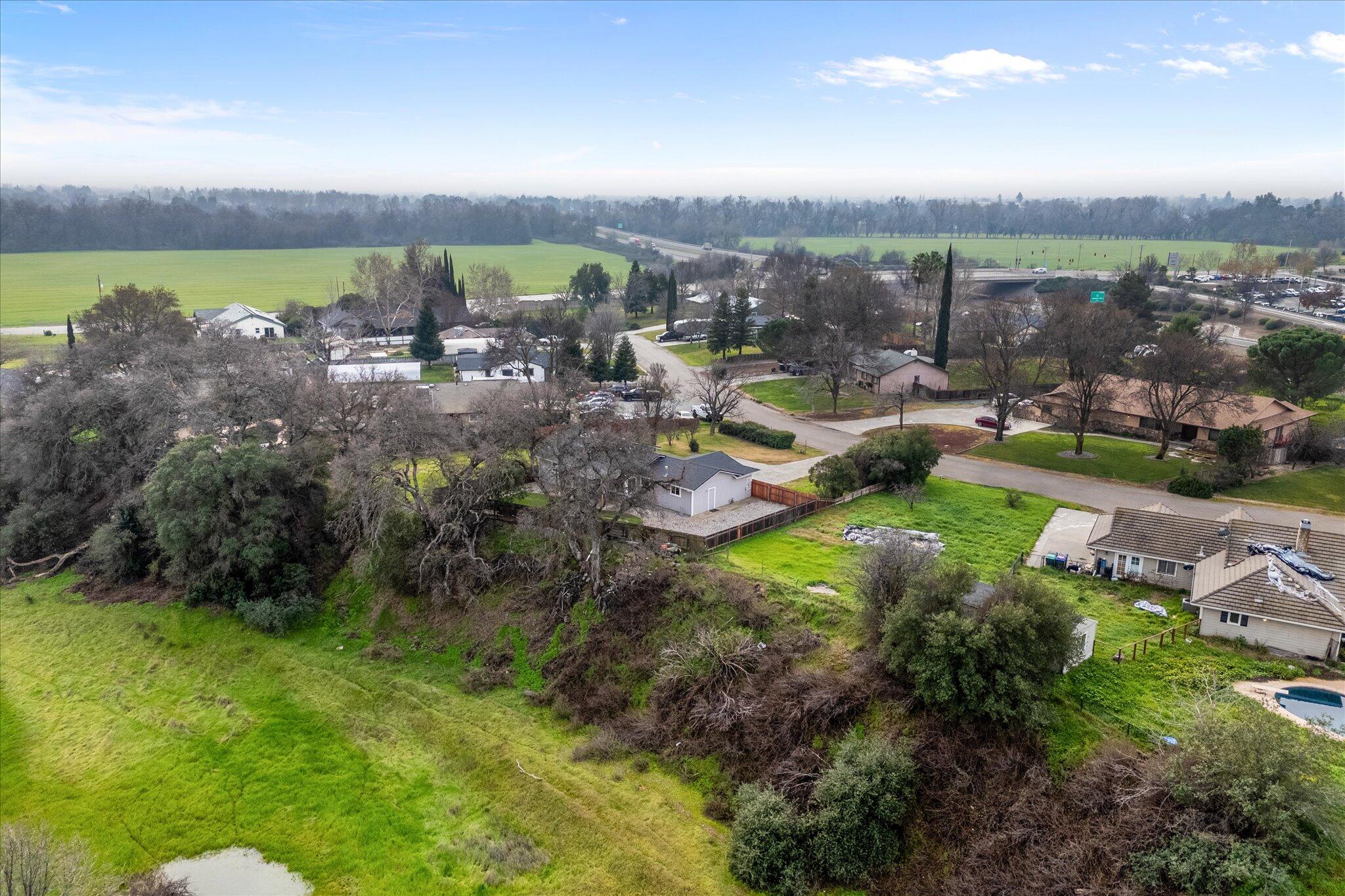 13770 Lisa Way Red Bluff, CA 96080 - Photo 42 of 43 a view of a city with a lake view