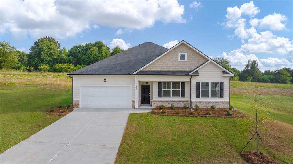 517 Ralph Still Road Dacula, GA 30019 - Photo 1 of 1 a front view of house with garden