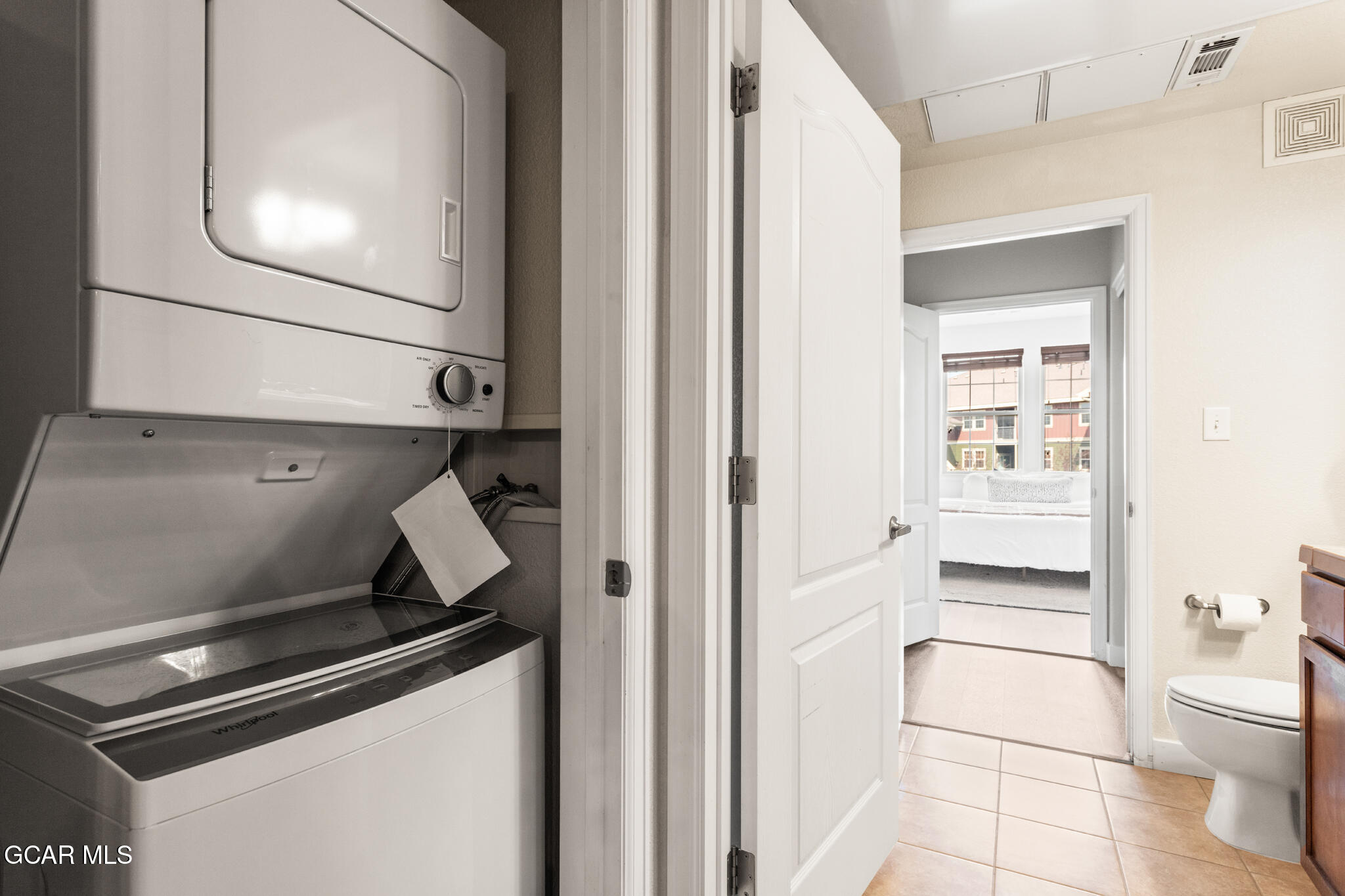 152 Village Road, Unit B206 Granby, CO 80446 - Photo 17 of 30 a close view of a stove and a refrigerator