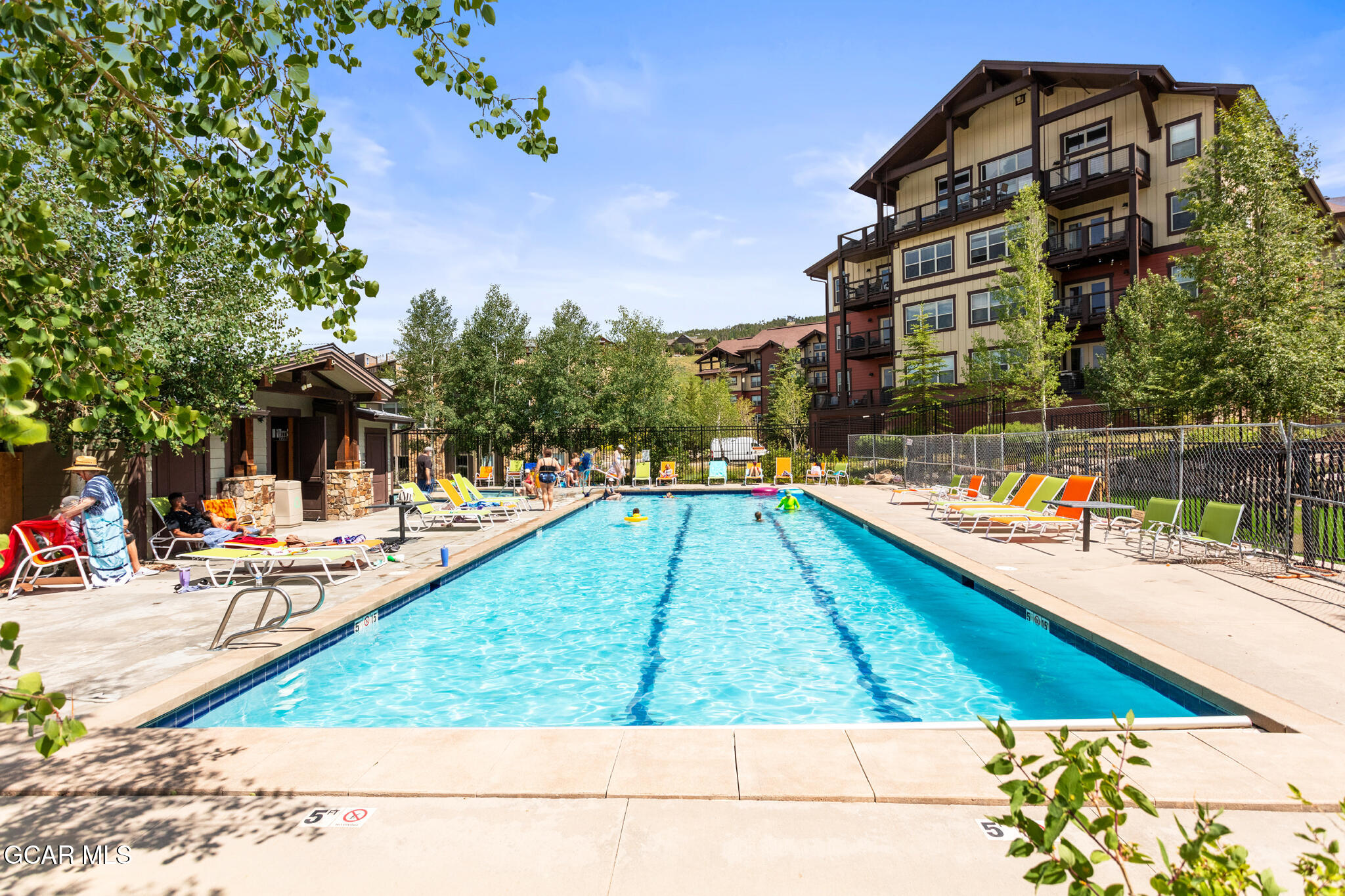 152 Village Road, Unit B206 Granby, CO 80446 - Photo 23 of 30 a view of swimming pool with chairs