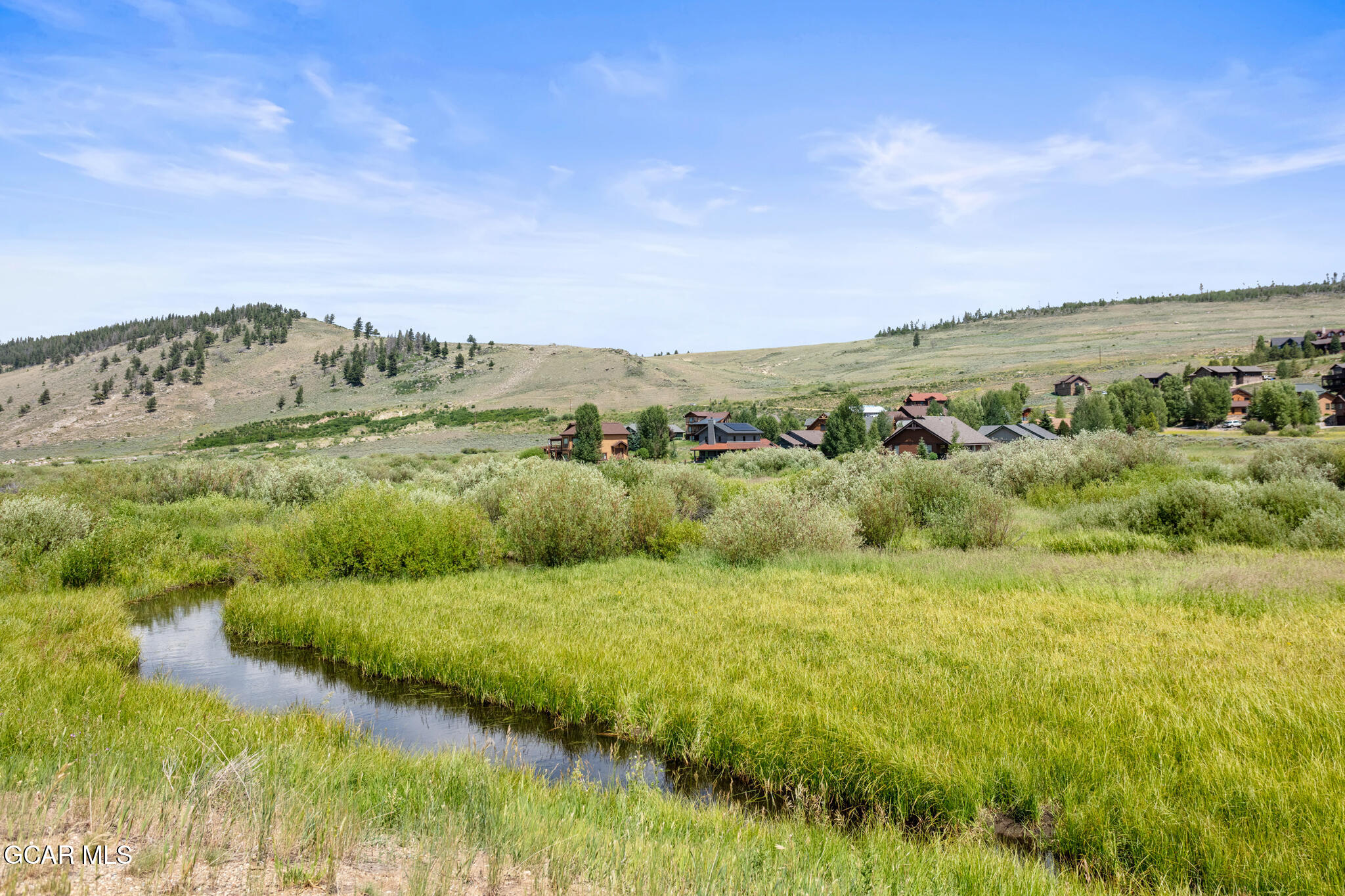 152 Village Road, Unit B206 Granby, CO 80446 - Photo 27 of 30 a view of a field with an ocean