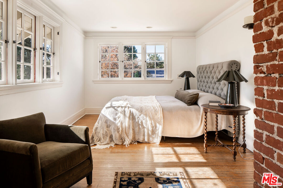 2107 Santa Rosa Avenue Altadena, CA 91001 - Photo 11 of 25 a bedroom with a bed and a couch