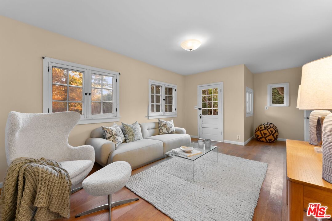 2107 Santa Rosa Avenue Altadena, CA 91001 - Photo 21 of 25 a living room with furniture window and a table