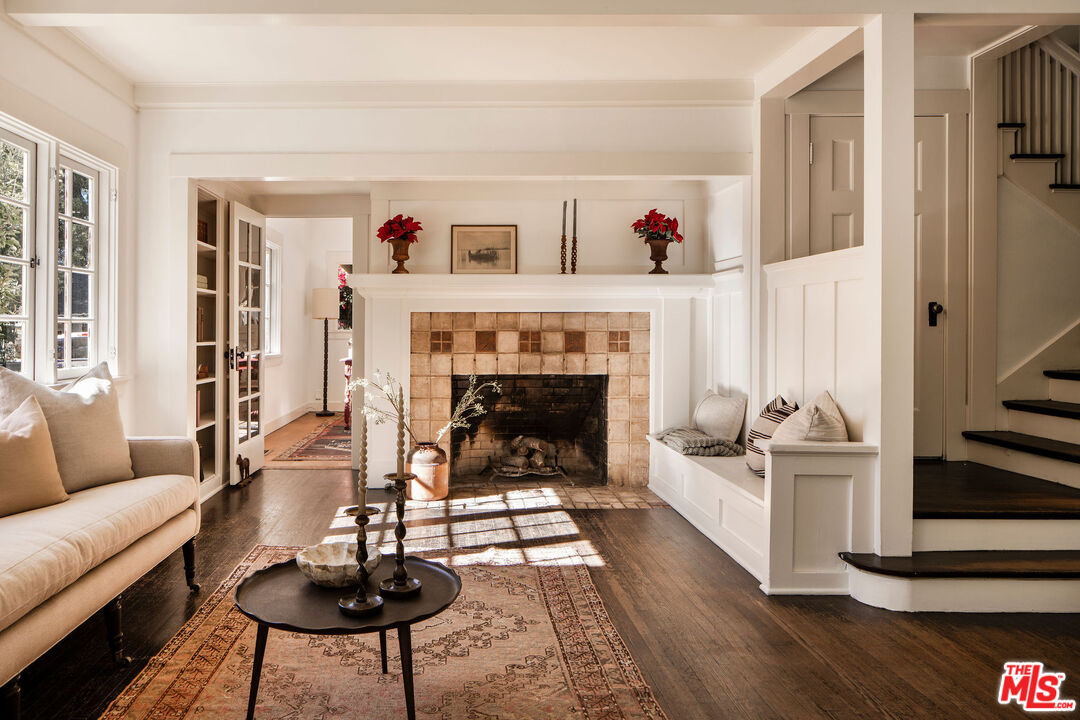 2107 Santa Rosa Avenue Altadena, CA 91001 - Photo 4 of 25 a living room with furniture and a fireplace