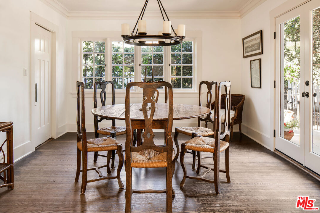 2107 Santa Rosa Avenue Altadena, CA 91001 - Photo 7 of 25 a dining room with furniture a chandelier and wooden floor