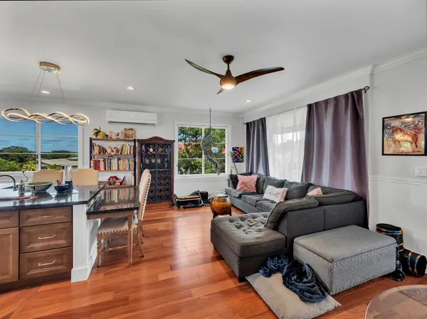 a living room with furniture and a window