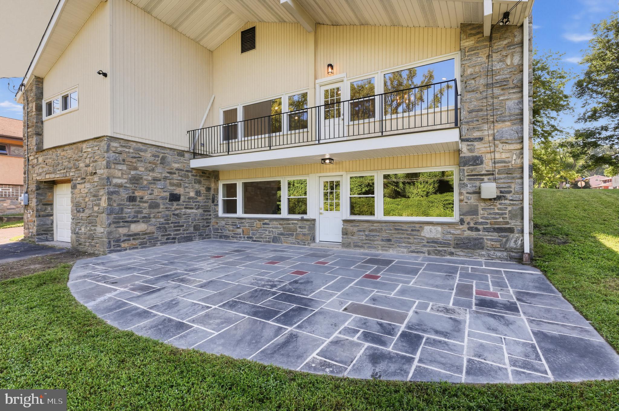 7724 Green Valley Road Wyncote, PA 19095 - Photo 20 of 24 Stone patio perfect for entertaining