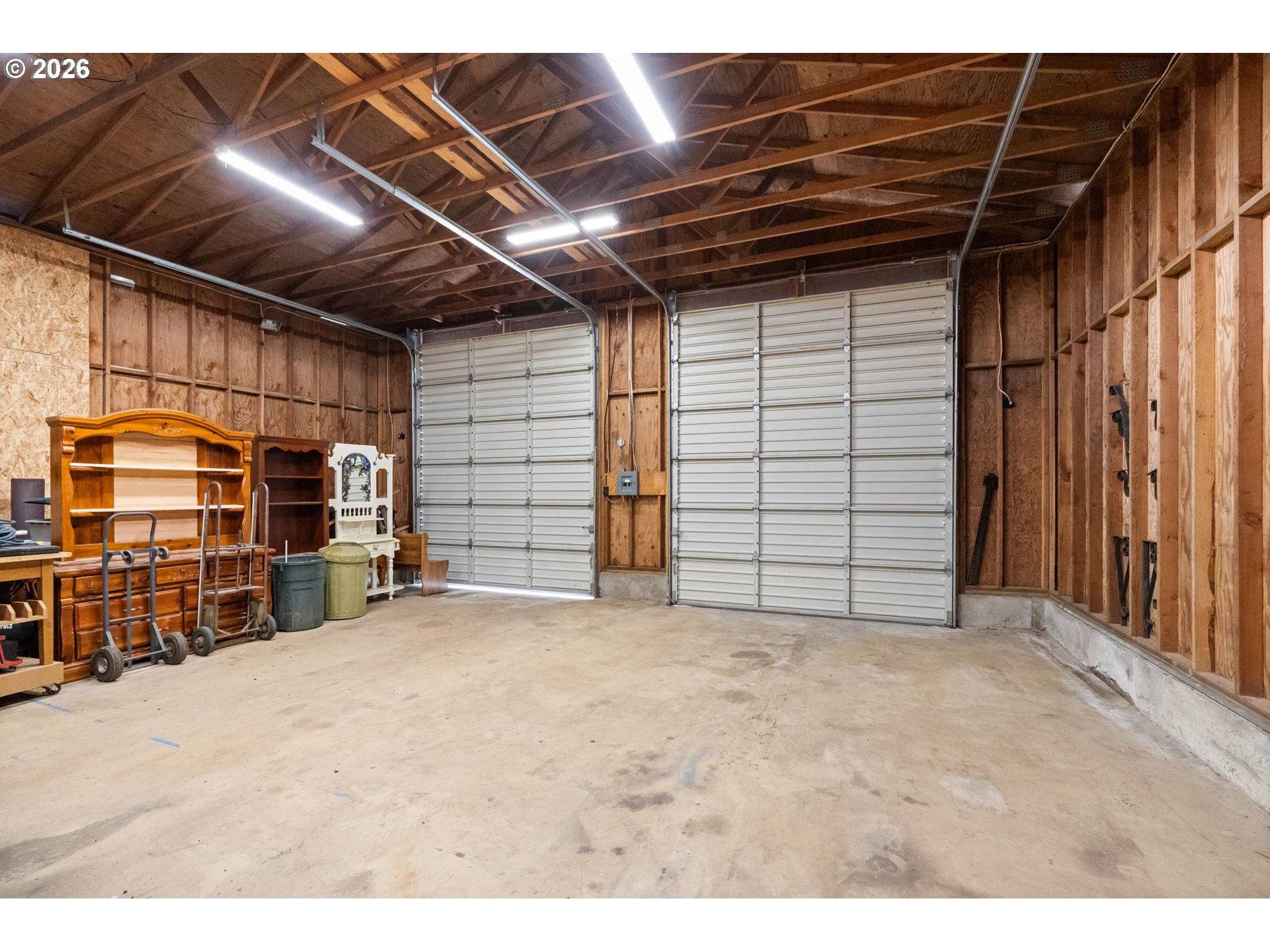 91448 Steinmetz Road Junction City, OR 97448 - Photo 42 of 48 a view of empty room with wooden ceiling
