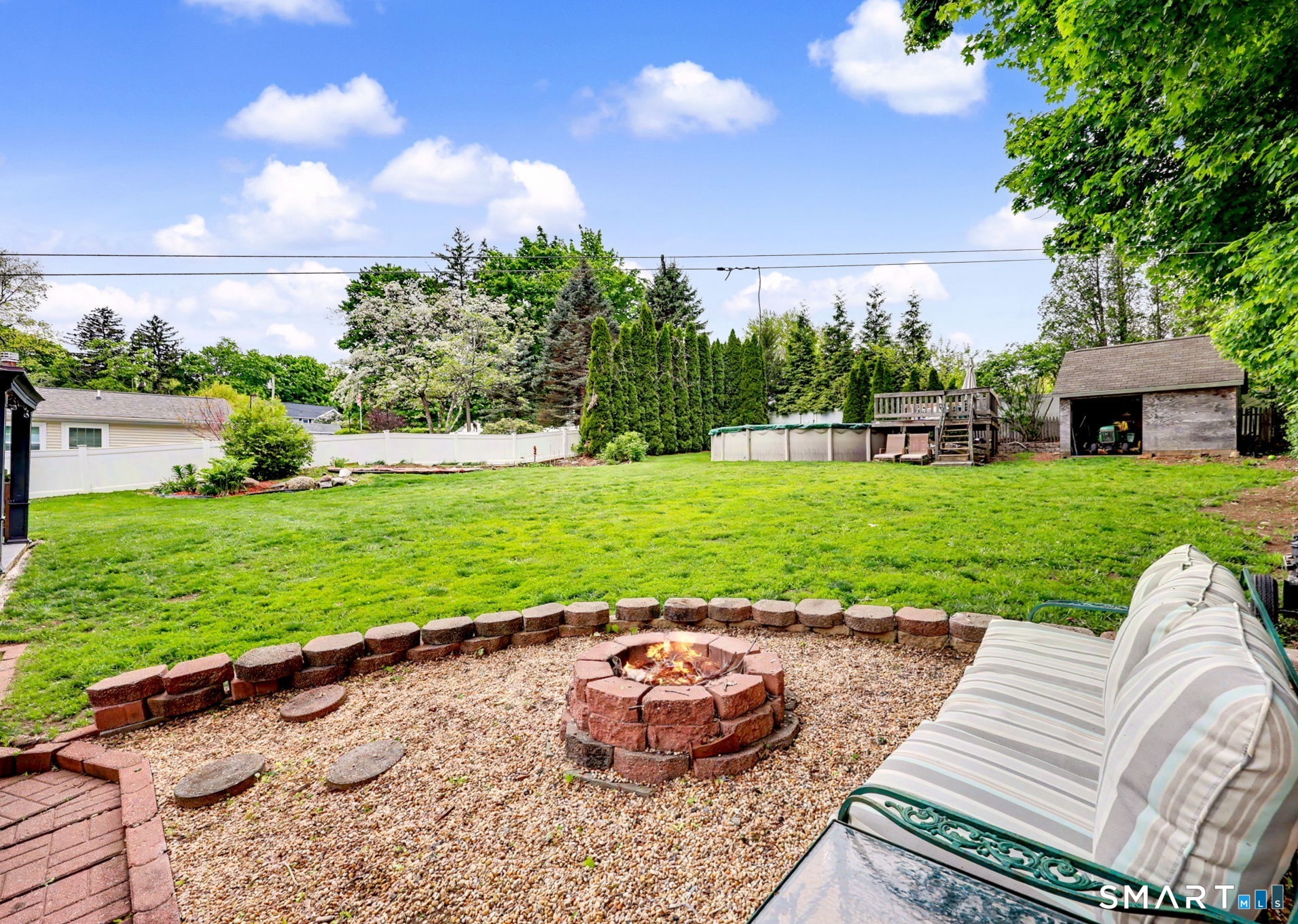 7 Merrill Road Trumbull, CT 06611 - Photo 40 of 40 a view of a backyard with sitting area