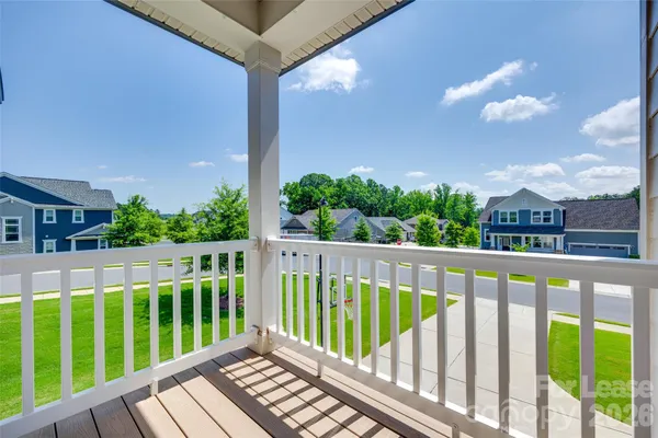 a view of a wooden roof deck