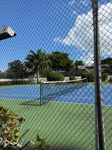 a view of a yard and a building