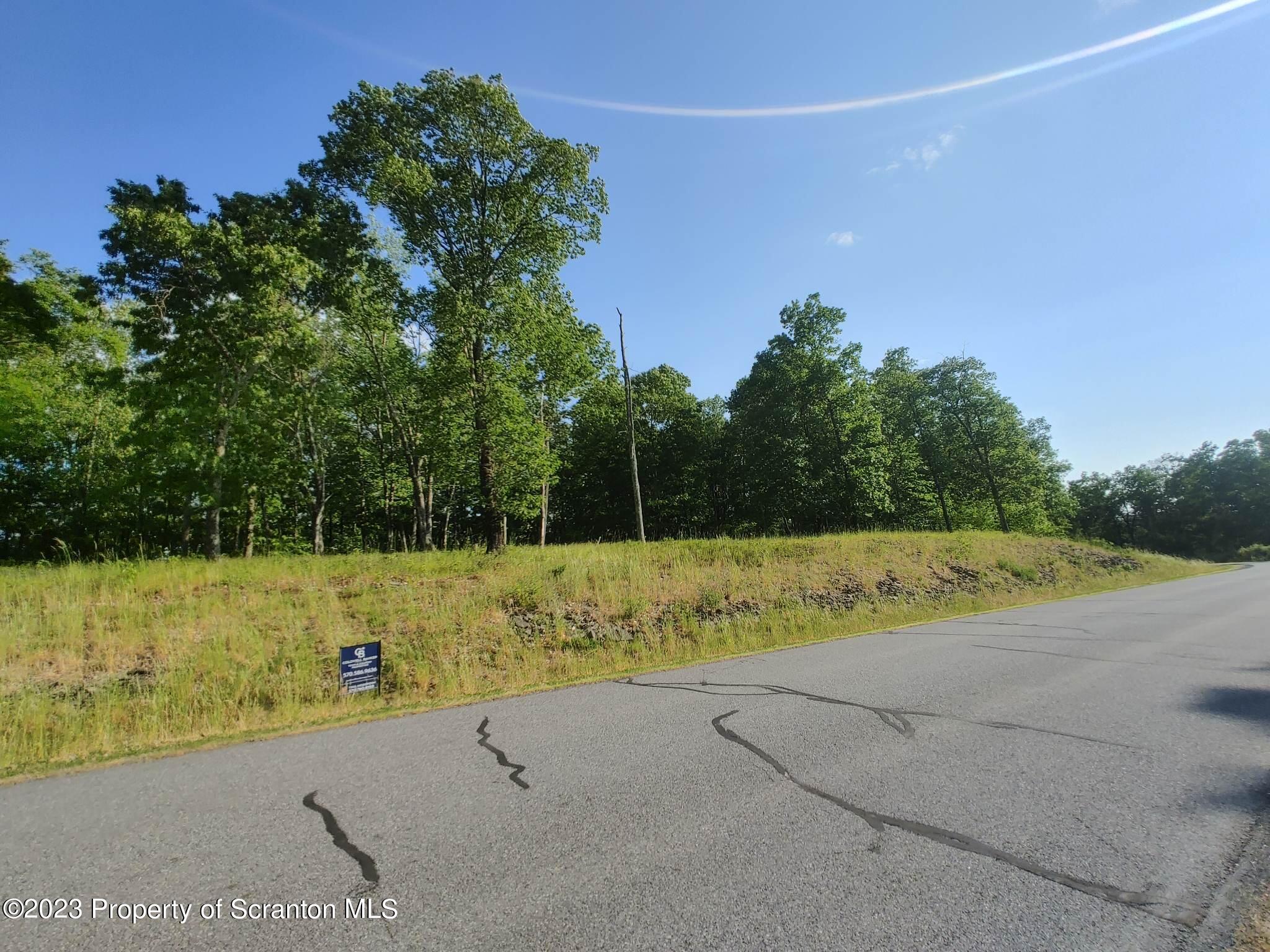 83 Scenicview Dallas, PA 18612 - Photo 3 of 8 a view of a field with an outdoor space
