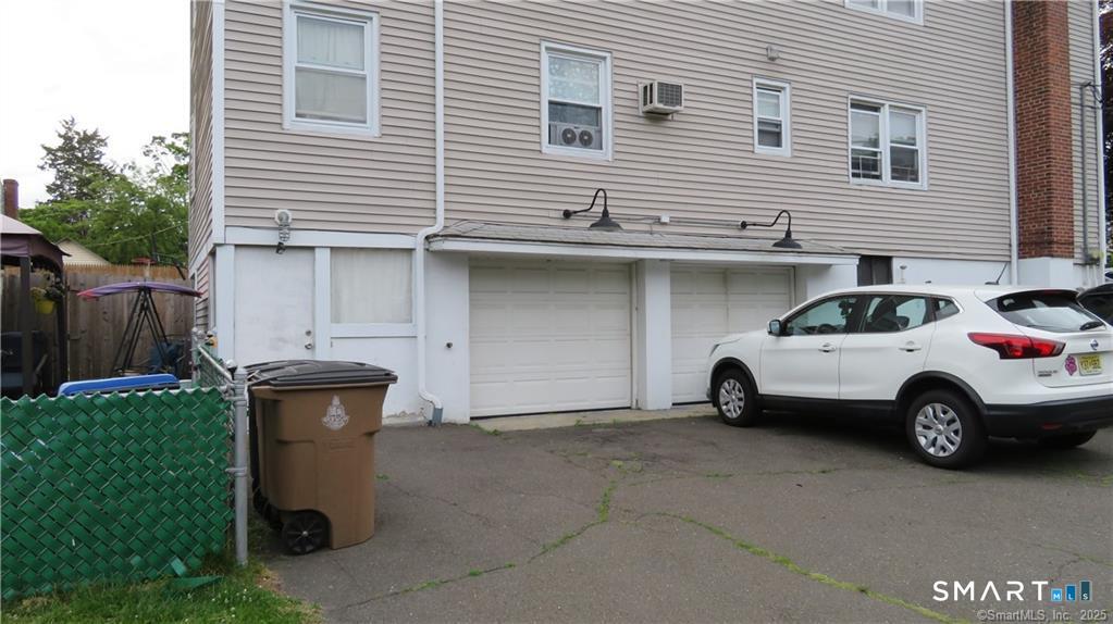 24 Congress Street Stamford, CT 06902 - Photo 11 of 11 Left Side Unit with patio fenced in outdoor garden space.