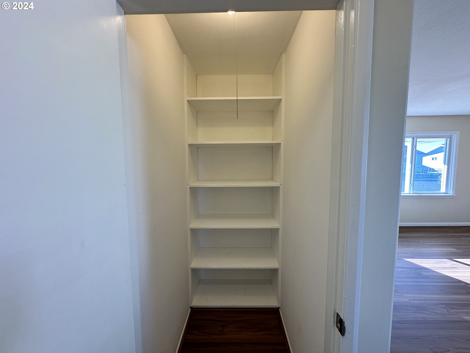 14865 Mount View Drive Condon, OR 97823 - Photo 11 of 23 a storage room with empty racks
