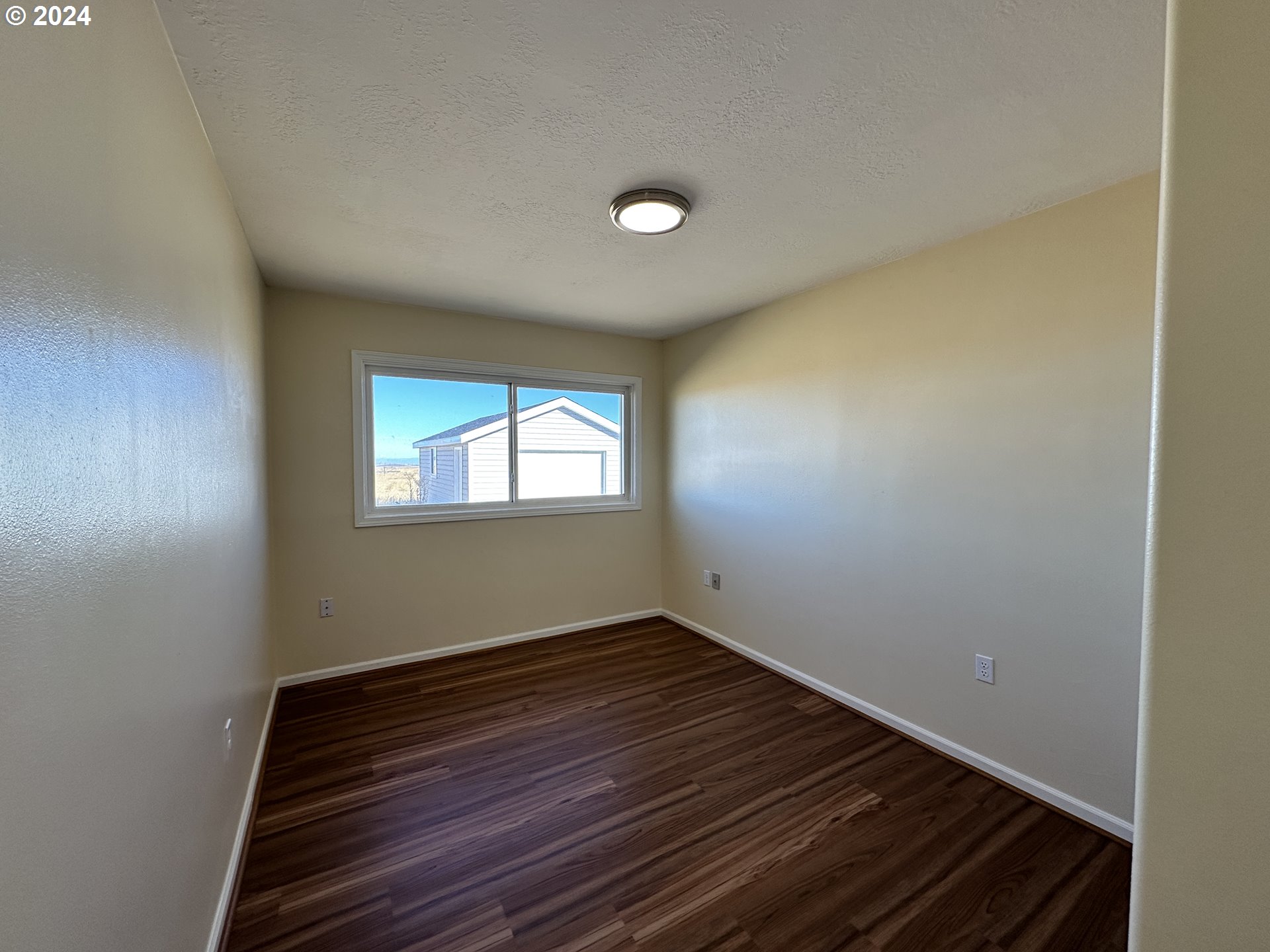 14865 Mount View Drive Condon, OR 97823 - Photo 15 of 23 a view of a room with wooden floor and staircase