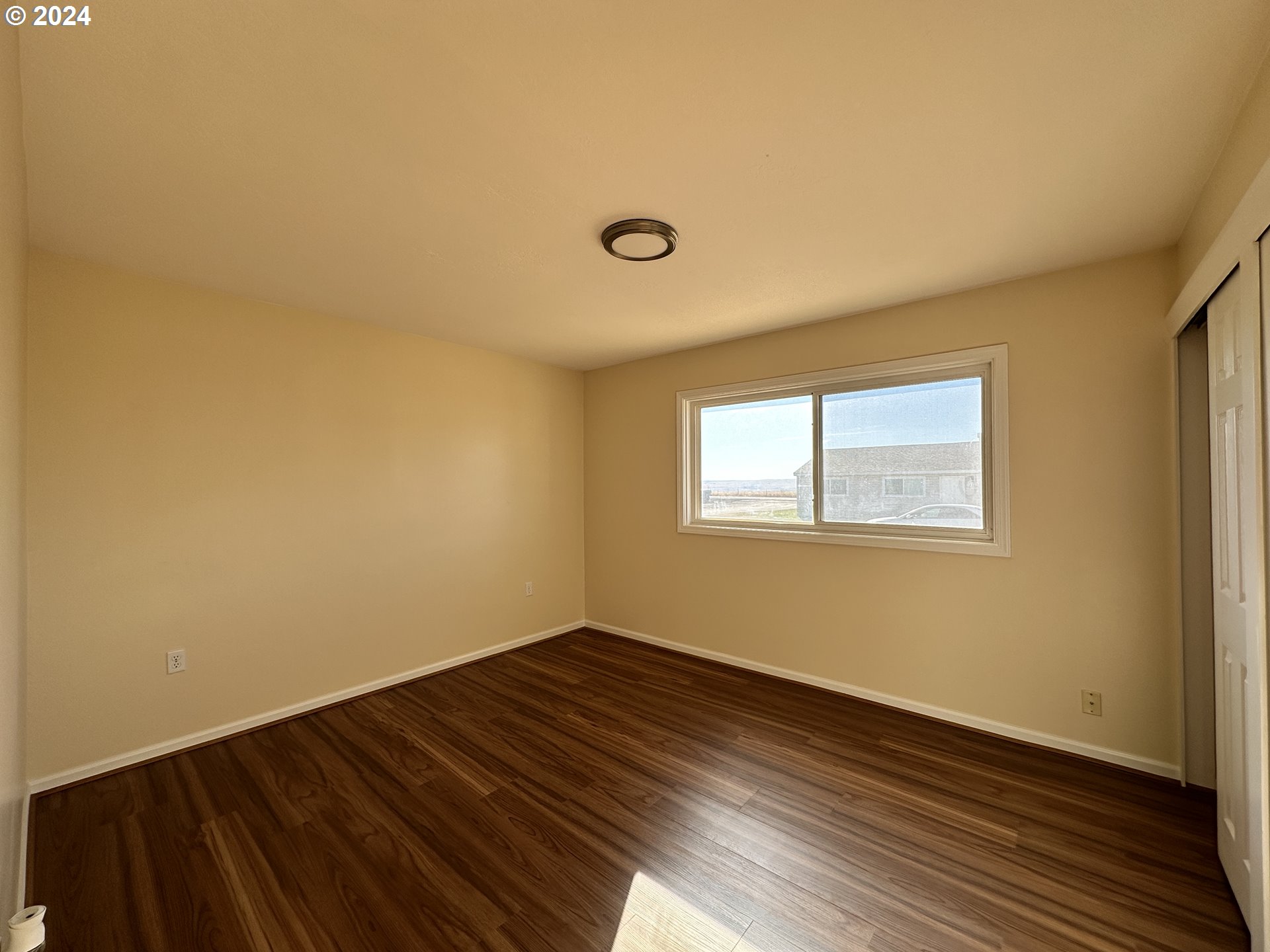 14865 Mount View Drive Condon, OR 97823 - Photo 17 of 23 a view of a room with wooden floor and a window