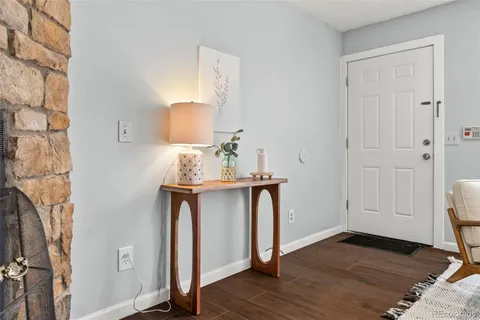a view of entryway with wooden floor