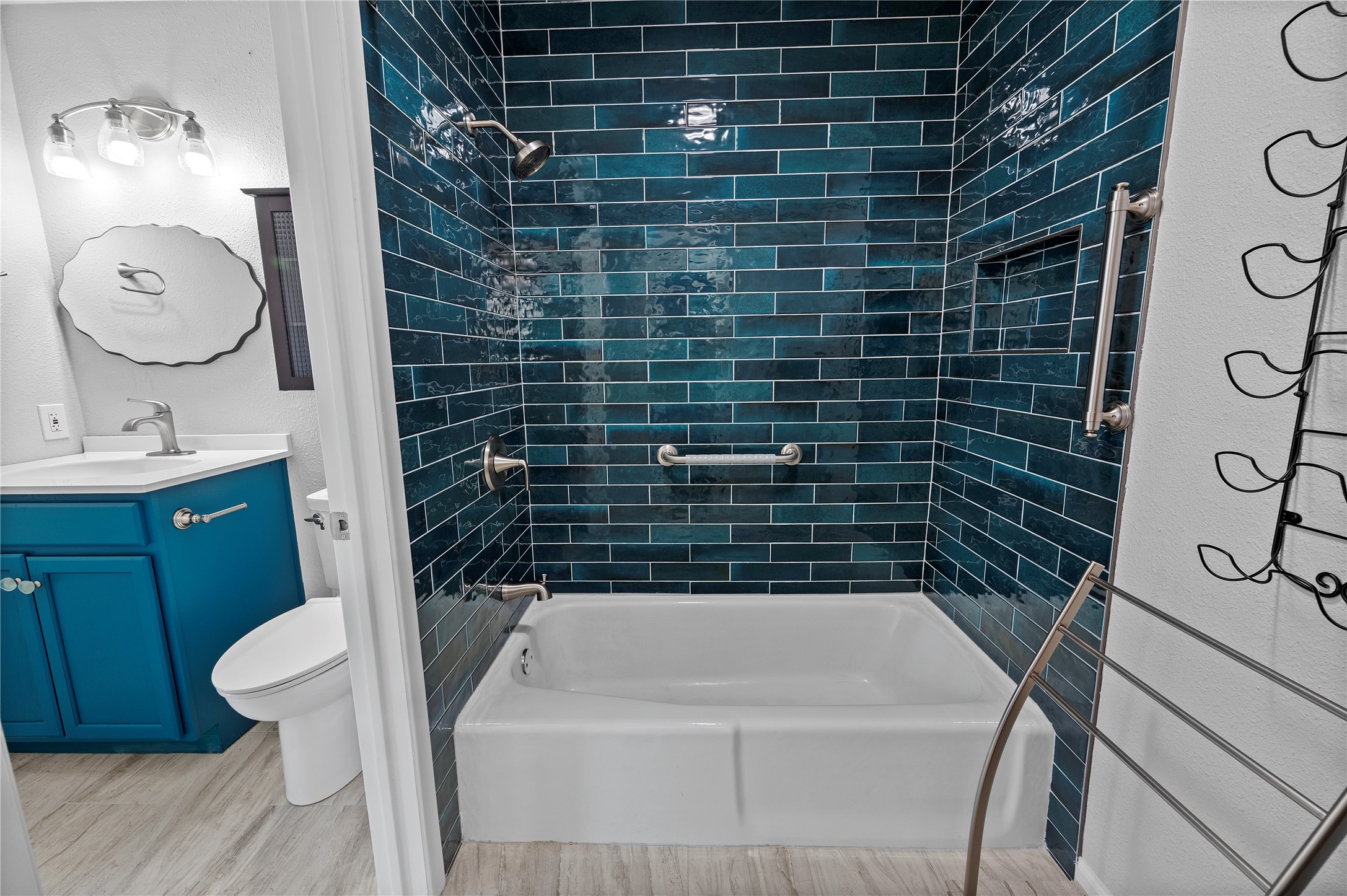 11301 Jollyville Road, Unit B3 Austin, TX 78759 - Photo 18 of 23 Bathroom with shower / bath combination, vanity, and light wood finished floors