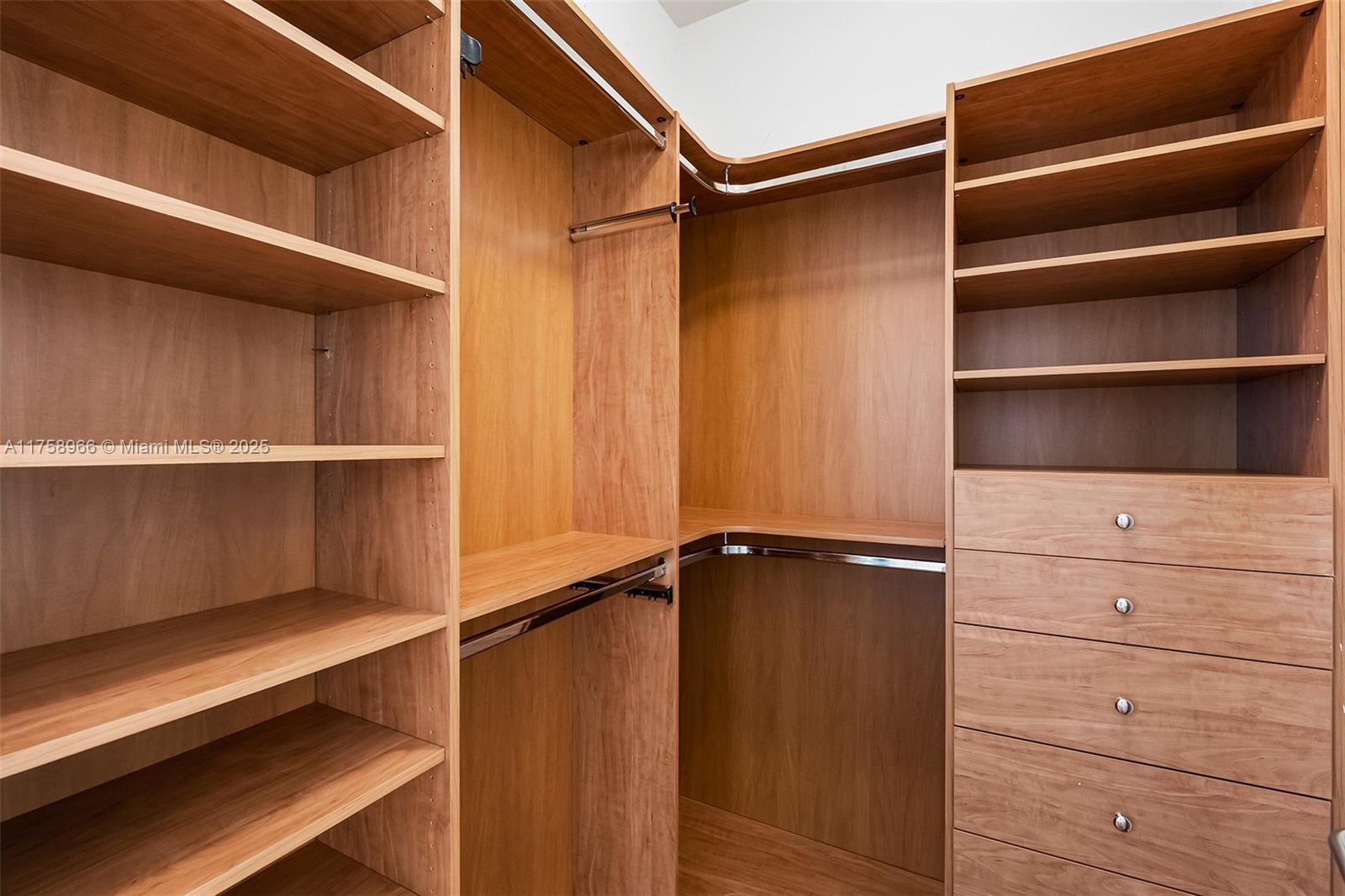 3131 Northeast 188th Street, Unit 1508 Aventura, FL 33180 - Photo 14 of 42 1 of 2 walking closets in the primary bedroom
