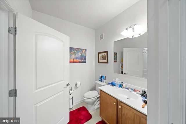 a view of a hallway view with living room and furniture