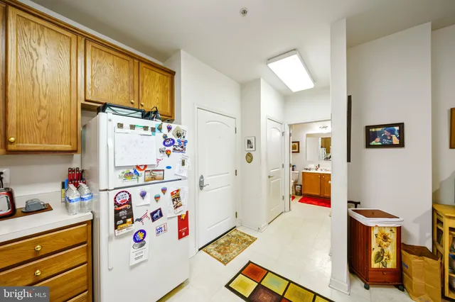 a view of living room filled with furniture and window