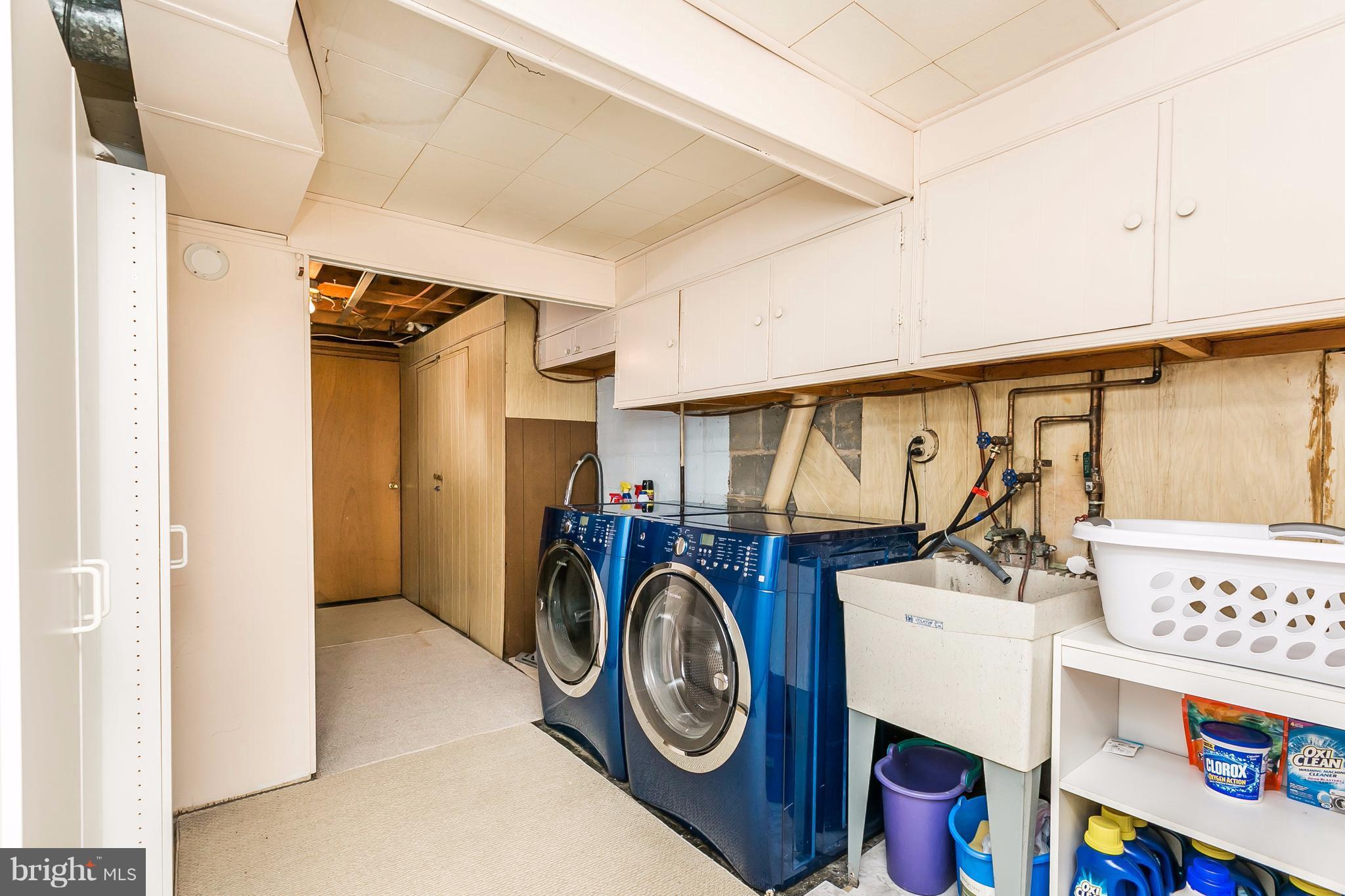 117 Northway Road Reisterstown, MD 21136 - Photo 19 of 25 LAUNDRY AREA W/LAUNDRY TUB & WASHER/DRYER