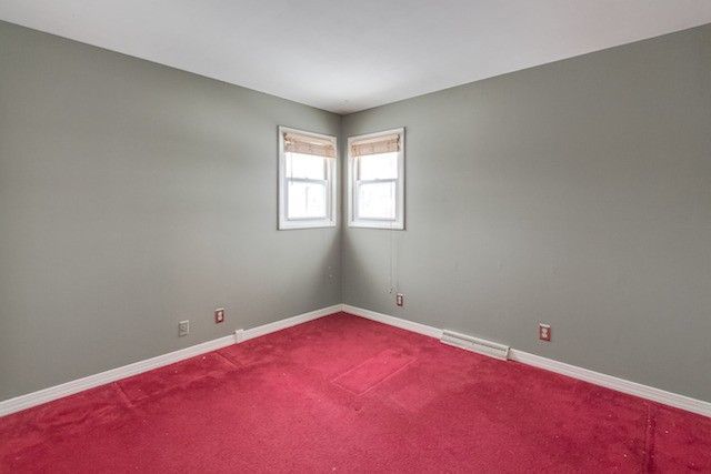 721 South Cooper Road New Lenox, IL 60451 - Photo 4 of 10 an empty room with a window