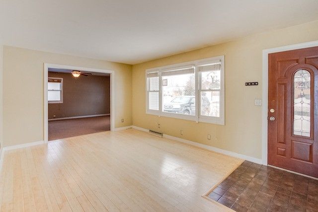 721 South Cooper Road New Lenox, IL 60451 - Photo 6 of 10 an empty room with windows and closet